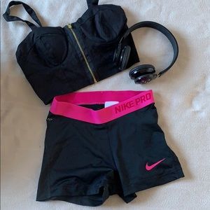Small black and pink nike pro shorts